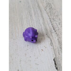 Purple miniature rubber Triceratops dinosaur toy figure
